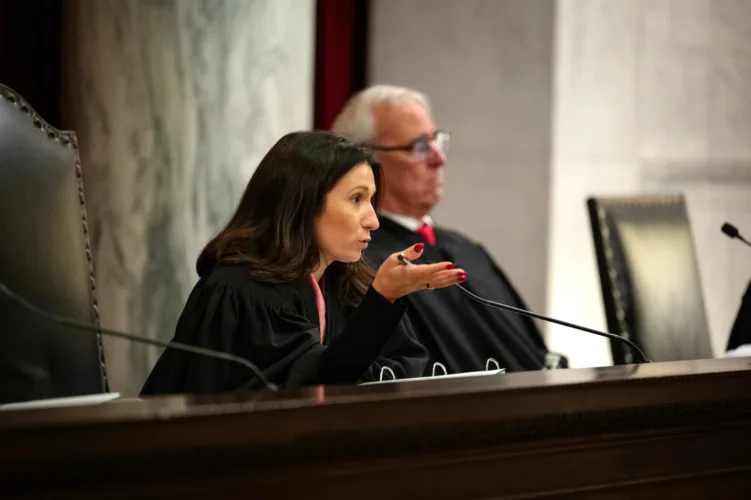 Justices hear arguments in case challenging education rule-making law
